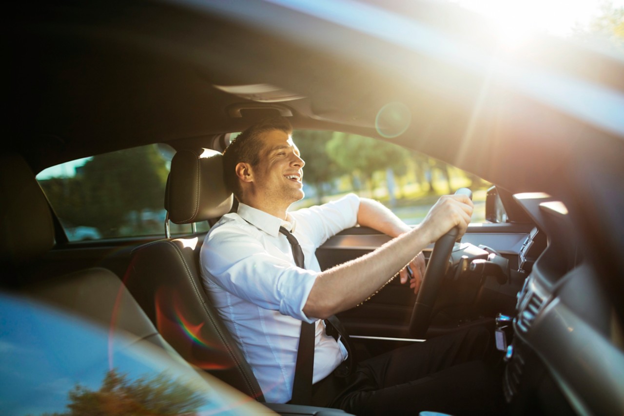 happy-man-in-car