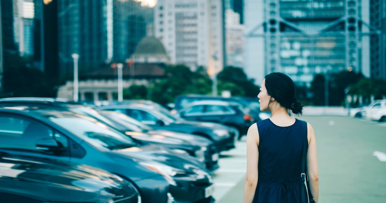 KINTO Fleet woman walking in a car park